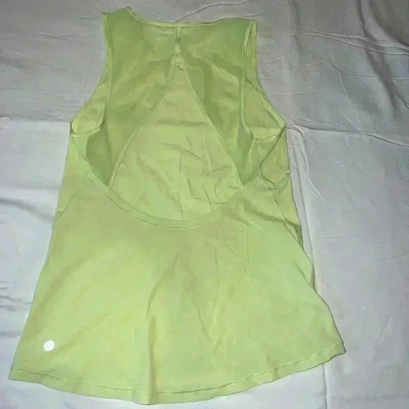 I’m selling a lululemon neon yellow tank top. - Picture 2 of 2
